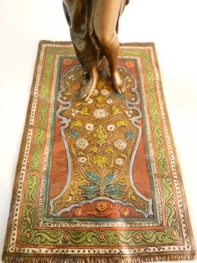 Antique sculpture "Dancer with a snake on the carpet"