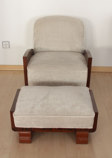 Antique armchair with ottoman