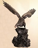 Antique sculpture "Eagle on the rock"