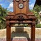 Antique fireplace portal with a clock