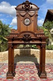 Antique fireplace portal with a clock