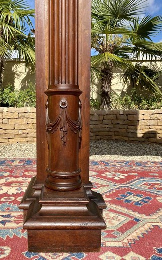 Antique fireplace portal with a clock