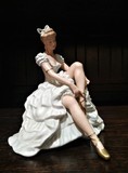 Sculpture "Ballerina, correcting pointe shoes"