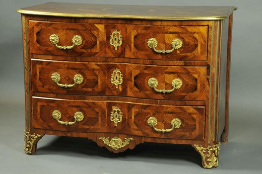 an antique chest of drawers