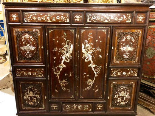antique cabinet made of wood with mother of pearl