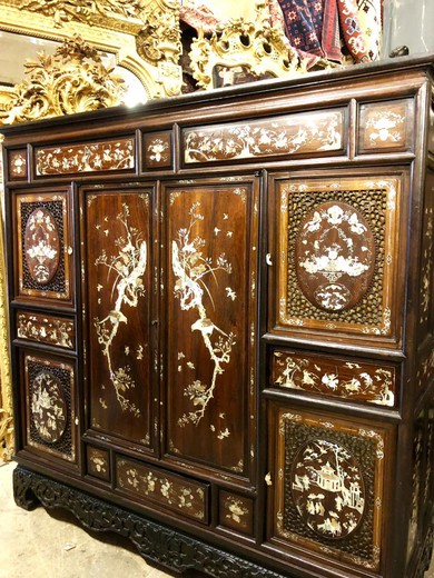 antique cabinet made of wood with mother of pearl