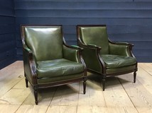 Paired leather armchairs in the style of Louis XVI