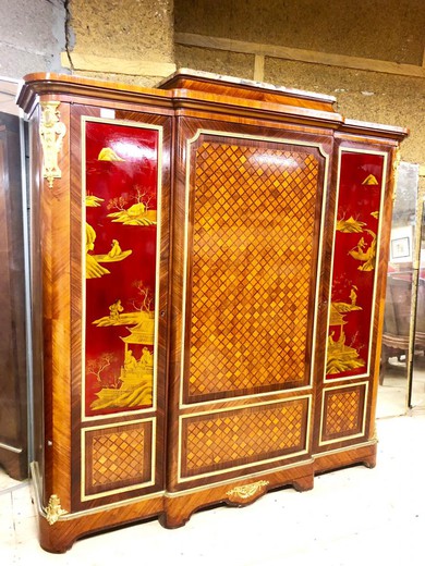 antique cabinet in wood and bronze