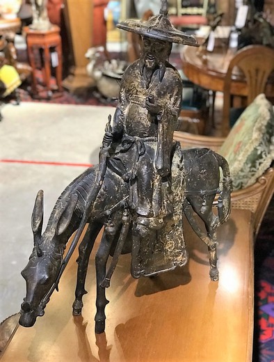 Antique sculpture "Sage on a mule"