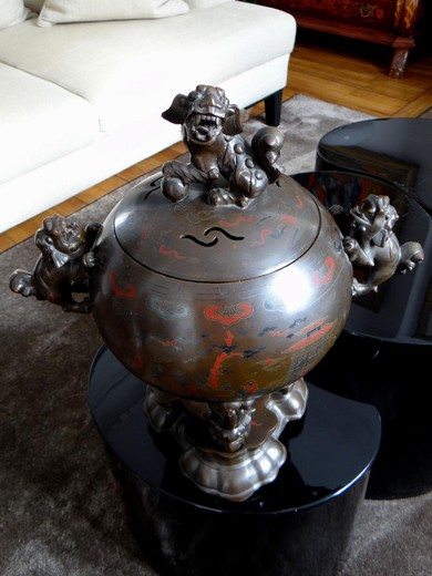 An old incense-burner made of bronze.ncense burner antique