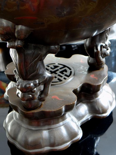 An old incense-burner made of bronze.ncense burner antique