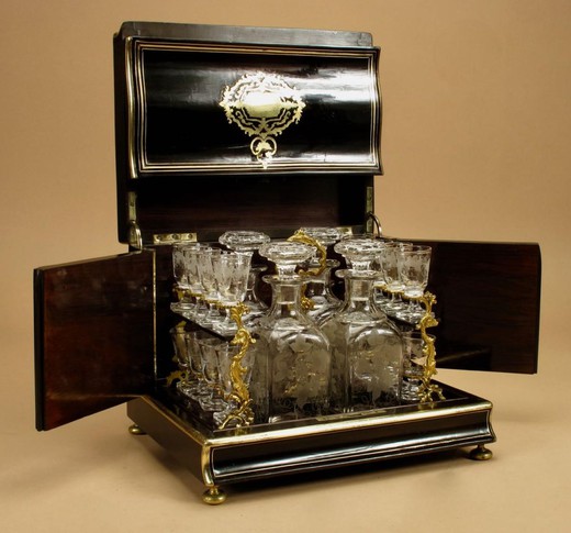 Antique tantalus liquor set