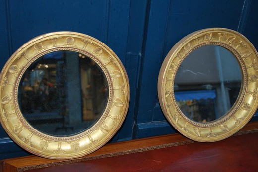 A pair of antique mirrors
