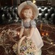 Antique sculpture "Girl with a basket"
