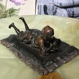 Antique sculpture "Boy on the carpet"