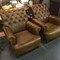 Leather twin armchairs