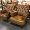 Leather twin armchairs