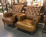 Leather twin armchairs