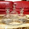 Set of three decanters on a tray