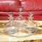 Set of three decanters on a tray