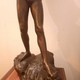 Антикварная скульптура «Юноша на камне»