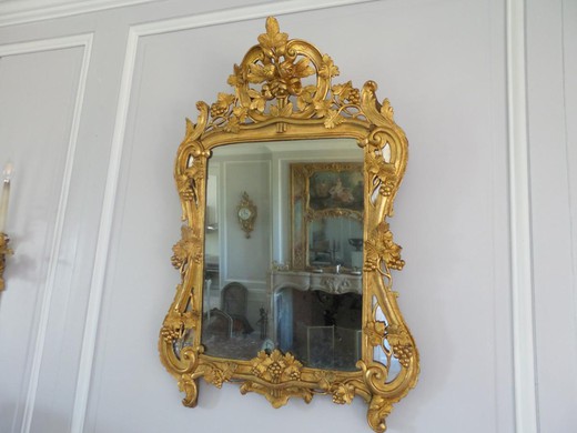 антикварное зеркало в стиле людовик 15 рококо в раме из золоченого дерева