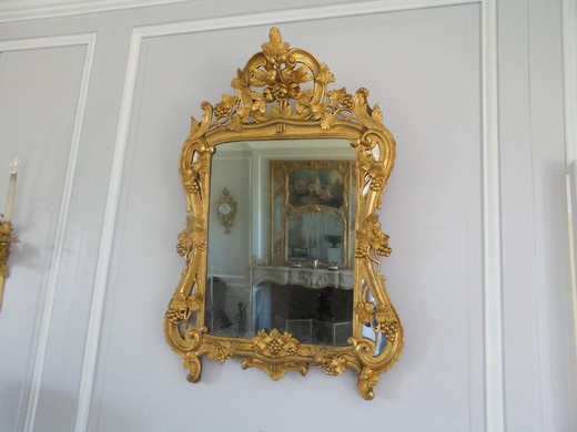старинное зеркало в стиле людовик 15 рококо в раме из золоченого дерева