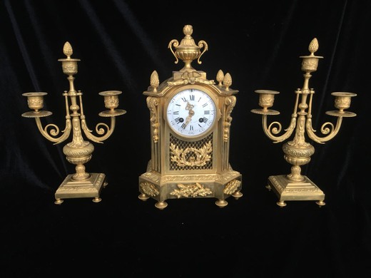 Antique clock with candelabra