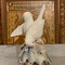 Antique statuette of two doves