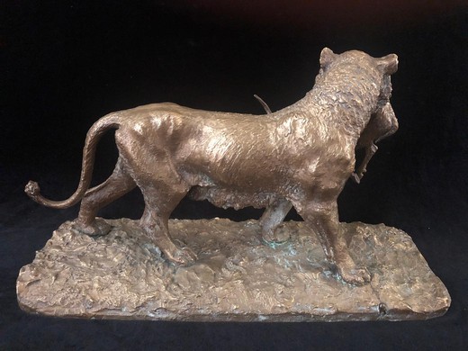 Antique sculpture "Lioness with prey"