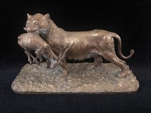 Antique sculpture "Lioness with prey"