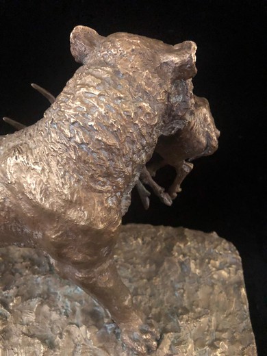 Antique sculpture "Lioness with prey"