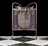 Antique armorial fire screen