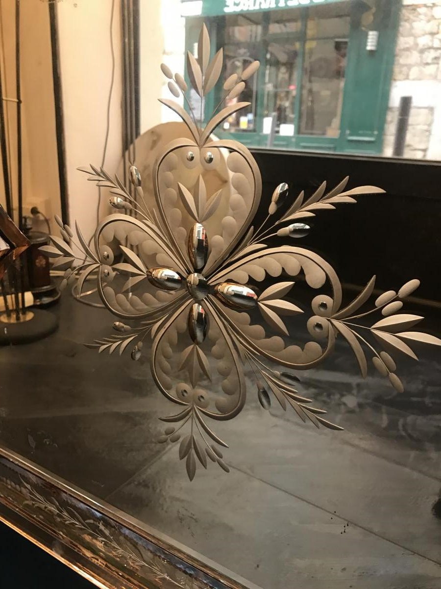 A Venetian glass mirrored commode