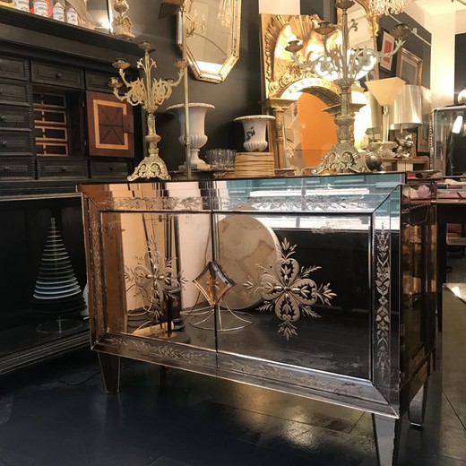 A Venetian glass mirrored commode