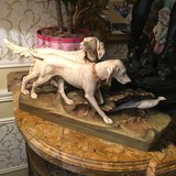 Antique statuette of hunting dogs