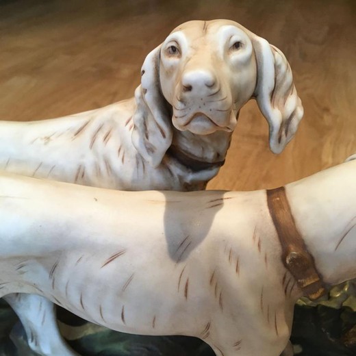 Antique statuette of hunting dogs