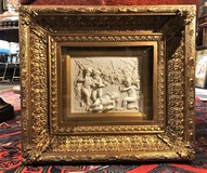 Antique bas-relief in a frame