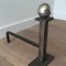 Jacques Adnet. Pair of modernist steel and chrome andirons. Circa 1920-40