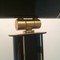 Black lacquered and brass floor lamp. Circa 1970