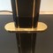 Black lacquered and brass floor lamp. Circa 1970