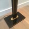 Black lacquered and brass floor lamp. Circa 1970