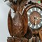 antique hinting style black forest wall clock
