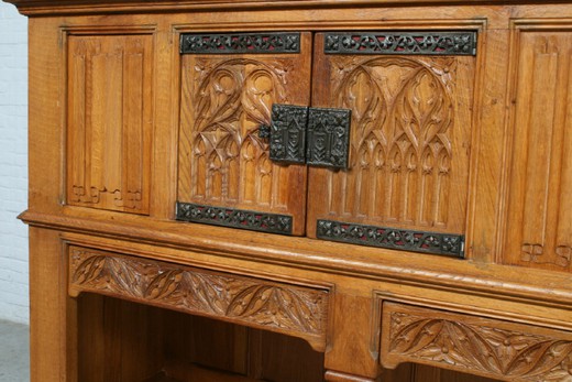 Antique sideboard in the Gothic style. Made of oak. Europe, the 1900s.