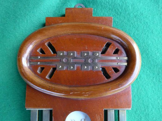 antique barometer with thermometer