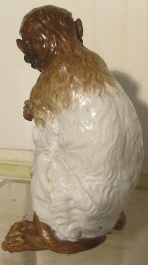 old porcelain sculpture monkey
