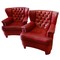 pair leather armchairs