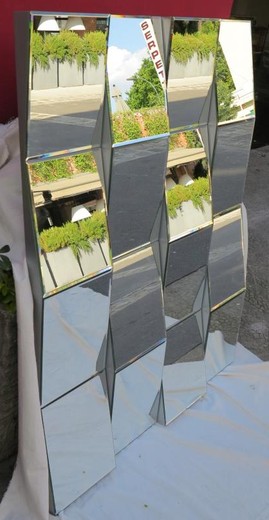 unusual lacquered wood mirror