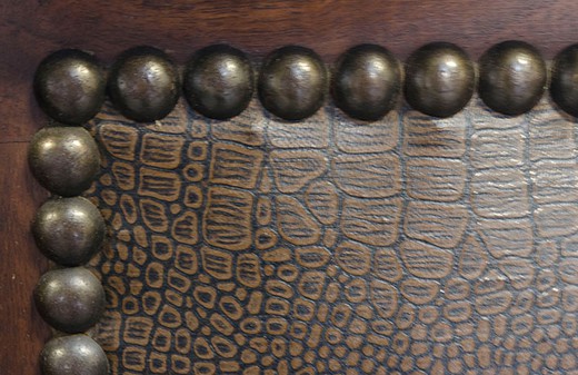 Antique bench in the Renaissance style. It is made of walnut. Europe, the 1880s.