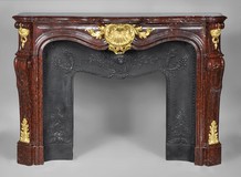 antique Louis XV griotte marble fireplace with gilded bronze